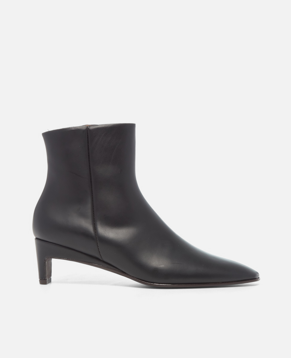 Black ankle boot on a white background