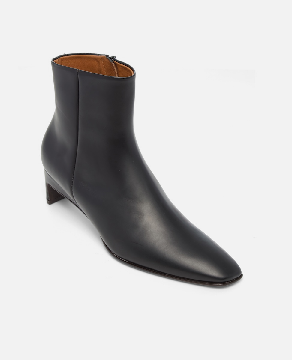 Black ankle boot on a white background