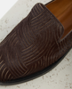 Brown textured loafer shoe on a light background 6