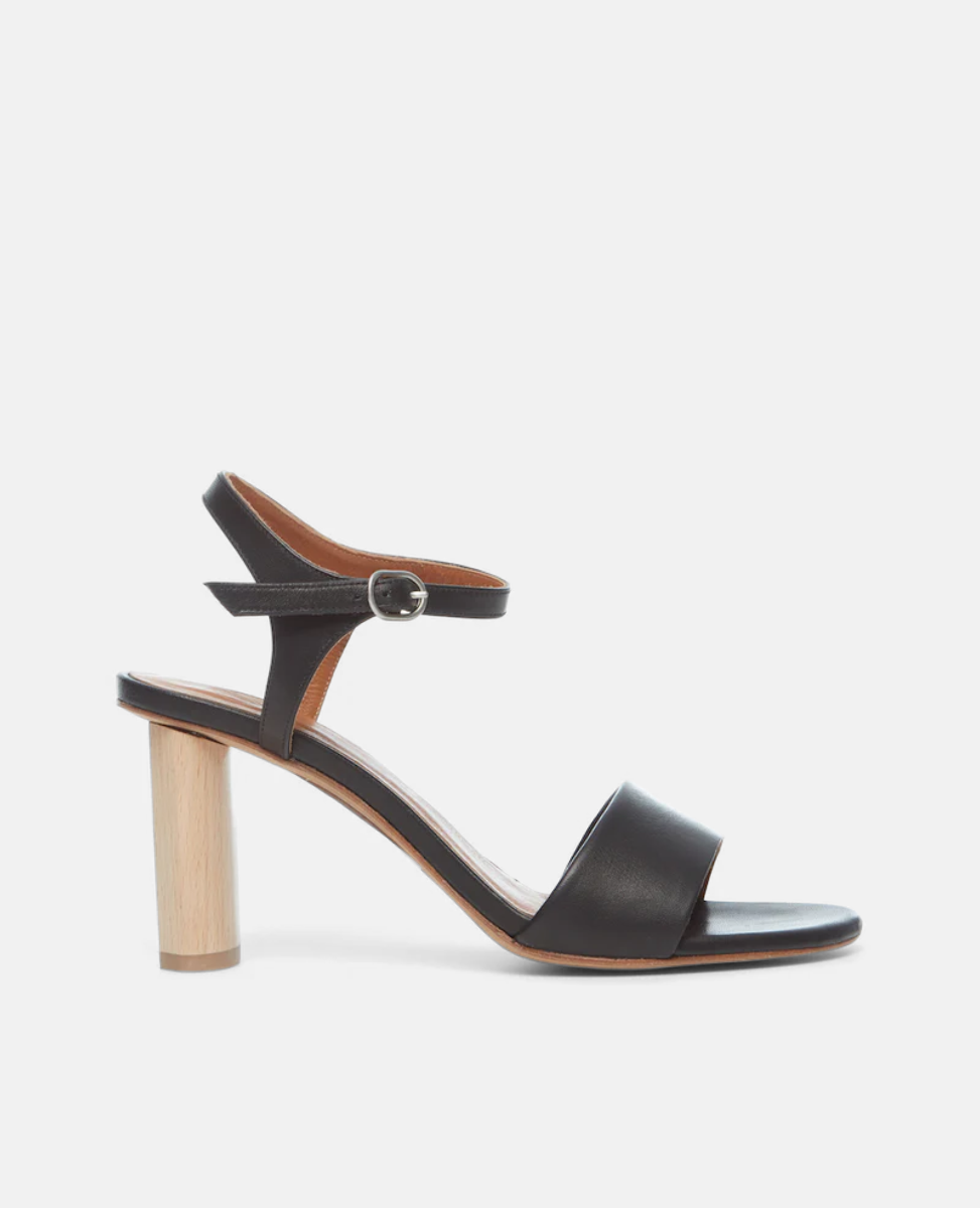 Side view of the Gigi Heel in modern, minimal classic black leather.