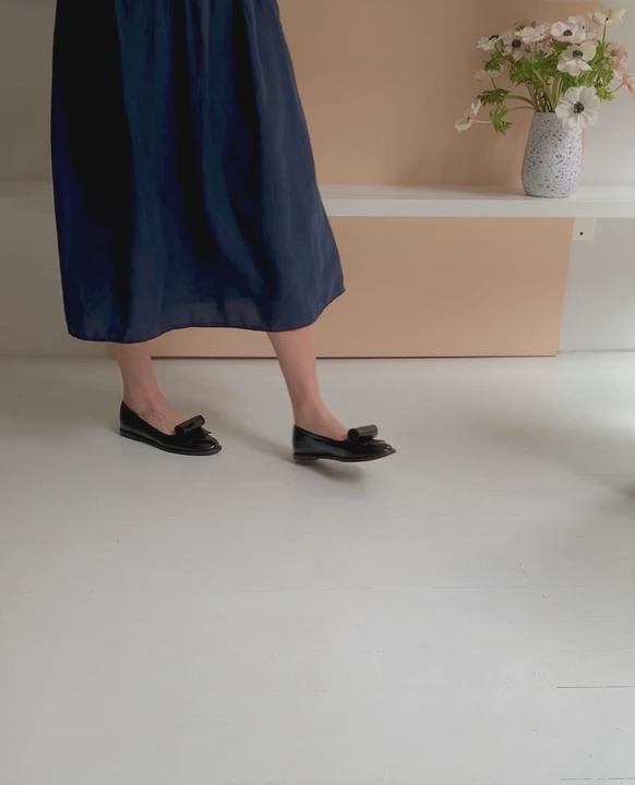 Woman walking in the Yale Loafer to show movement and fit.