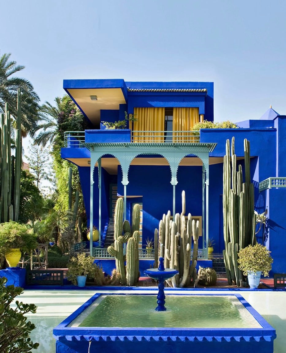 Photo from a journal story about Morocco, the color of the house matches the color of the shoes