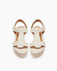 Top view of Coclico Ally Clog in Greige (off-white) leather: Open t-strap sandal on a wood wedge platform. Velcro closure. 3