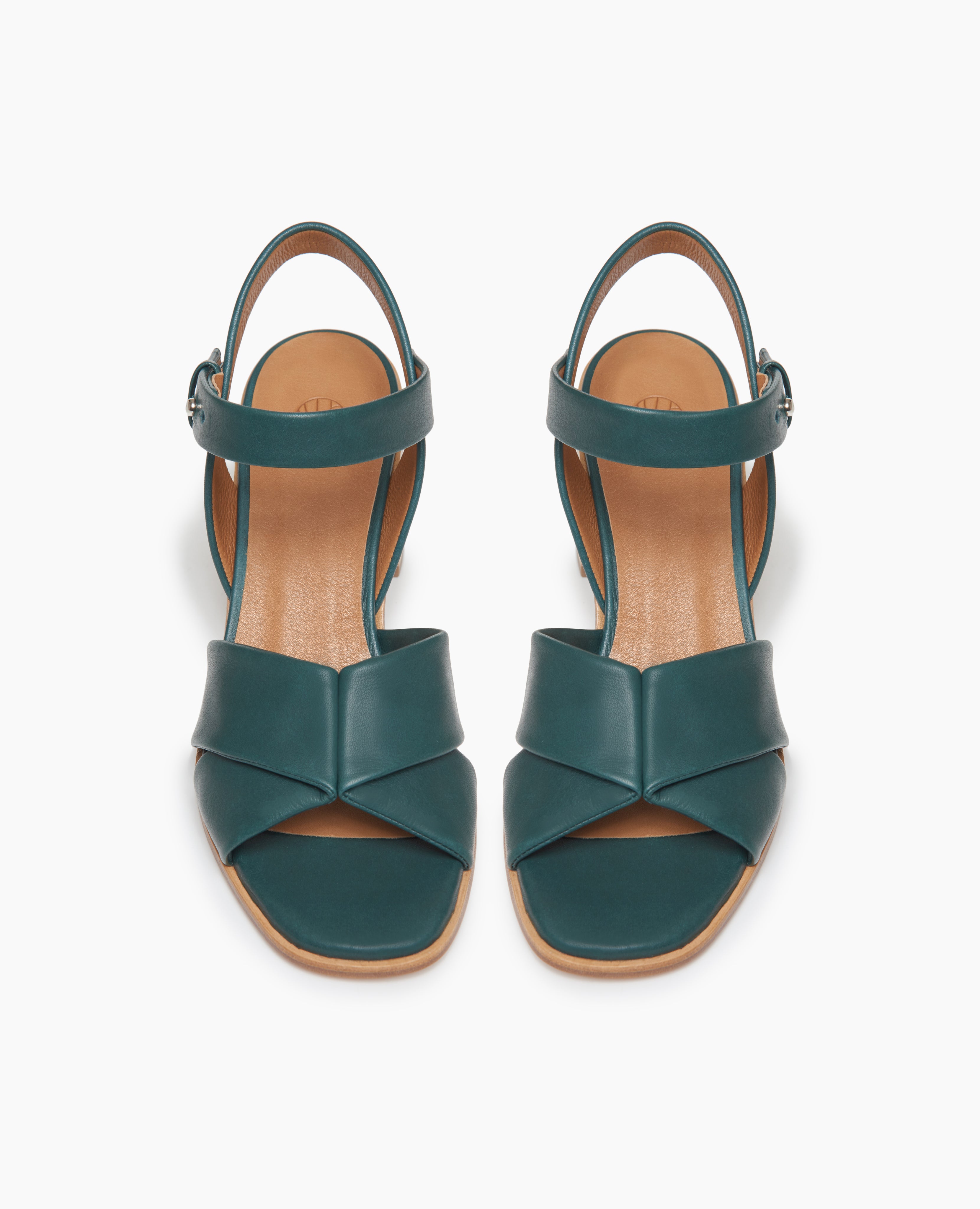 Bay Heel in Riviera leather: open sandal with 2 tubular straps across the foot, ankle strap, peg closure, wood block mid-height heel - top view.