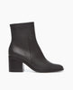 Side view of Coclico Befo Boot in Deep Sea leather: a black leather stack, block wood heel with a rounded toe box. 1