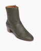 Coclico Caviar Boot in Bosco leather, angle view: simple & modern boot with a low-height wood block heel, inside zip closure and tall shaft height. 2