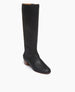 Coclico Chip Boot in Black nubuck, angle view : knee-high boot with an inside zip closure, elastic goring, seam detailing across arch and low-height solid wood block heel.   2