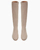 Top view of the Coclico Chip Boot in Limestone nubuck: knee-high boot with elastic goring, seam detailing across arch, inside zip closure, and a low-height solid wood block heel. 5