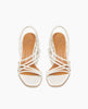 Coclico Diana Wedge in Greige leather, top view: Open wedge with tubular leather straps across the foot, solid wood mid-height wedge, slingback heel strap. 3