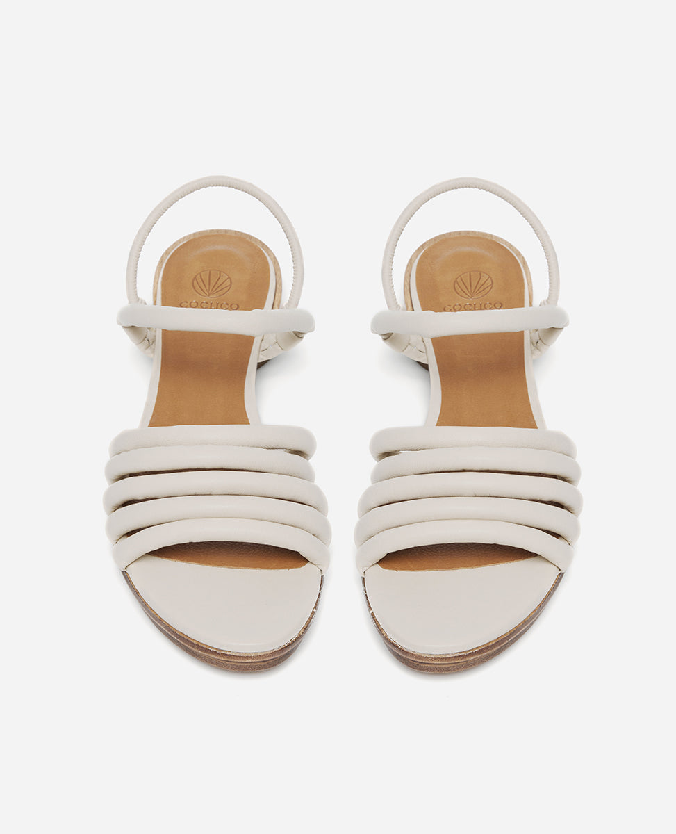 Coclico Emma Sandal in Greige nubuck, top view: open sandal with elasticated back strap, 5 padded straps across the foot, raised two-part wood and leather sole.