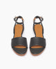 Coclico Erren Sandal in Deep Sea leather: open sandal with leather front band, tubular ankle strap that crisscrosses behind the heel, raised two-part wood and leather sole - top view. 6