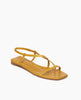 Angle view: Coclico Frond Sandal in Ambra leather, an open sandal with narrow asymmetric straps across foot, back strap, squared-off at the toe and heel. 2