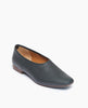 Coclico Haloumi Flat in Deep Sea leather, angle view: Slip-on, form-fitting flat in Italian certified sustainable leather with a squared-off toe and a 10mm solid wood heel. 2