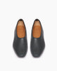 Coclico Haloumi Flat in Deep Sea leather, a slip-on, form-fitting flat in Italian certified sustainable leather with a squared-off toe and a 10mm solid wood heel - top view. 3