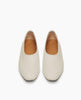 Top view of the Coclico Haloumi Flat in Greige leather, a slip-on, form-fitting flat in Italian certified sustainable leather with a squared-off toe and a 10mm solid wood heel. 3