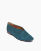Coclico Harissa Flat in Bottle suede, a slip-on high vamped flat with a softly rounded toe, leather sole and a 10mm solid wood heel - angle view. 2