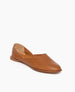 Coclico Henri Flat in Cuoio leather, angled view: flat slide-on style with round toe and high-vamped scooped throat line.  2