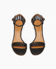 Top view: Coclico Iris Heel in Black leather: leather-wrapped demi-wedge, 3 thin straps across front of the foot, fan effect of straps cupping heel, walnut wood heel. 3