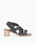 Side view of Coclico Jade Heel in Deep Sea leather: open slip on sandal with leather tube straps across the foot, ankle strap, wood block mid-height heel. 1