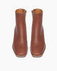 Coclico Juju Boot in Caramello leather, top view: a minimalist boot featuring a mid-height solid wood block heel, inside zip closure, soft squared-off toe, mid-height shaft. 3