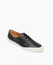Coclico Klara Sneaker in Deep Sea (almost black) leather, angle view: a lightly lined lace-up sneaker with a recycled rubber shell, flat-like feel.  2