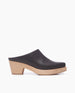 Side view of Coclico Kule Clog in Black leather: Slip-on mule, tapered toe, mid-height solid wood base. 1
