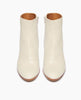 Coclico Lodi Boot in Greige leather, top view: solid-wood, sculpted, inset 75mm height wedge with inside zip closure, rounded toe and seam detail on top of foot. 2