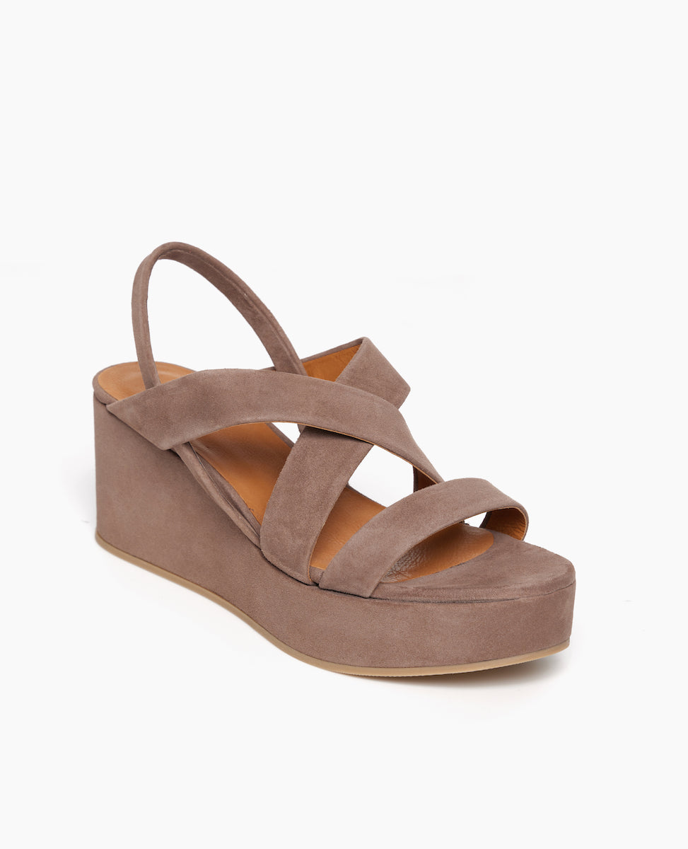 Coclico Lylo Wedge in Smoke suede a suede wrapped cork wedge, elasticated slingback strap, crisscrossed straps across foot - angle view.