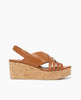Side view of Coclico Moska Wedge in Cuoio leather a Huarache inspired cork wedge with a woven leather band across foot, slingback strap. 1