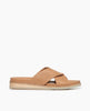 Coclico Pasque Sandal in Mandorla leather, a low pine wedge slide sandal with gum-rubber sole and intertwined leather tube straps across foot - side view. 1