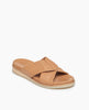 Coclico Pasque Sandal in Mandorla leather:angle view of a low pine wedge slide sandal with gum-rubber sole and intertwined leather tube straps across foot. 6