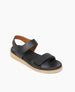 Angle view of Coclico Peeper Sandal in Deep Sea leather: a low pine wedge sandal with two-straps, leather-wrapped footbed, gum-rubber sole. Velcro closure. 3
