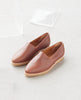 Angle view of the Coclico Ponzu Loafer in Caramello, a slim fit pointed-toe, high-vamped, slip-on loafer with a 10mm natural crepe sole. 3