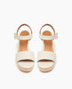 Top view: Coclico Riviera Clog in Greige (off-white) leather: wide front band, quarter-strap, buckle closure, with a solid wood platform to match the solid wood mid-height heel. 3