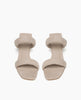 Coclico Sofiya Heel in Limestone nubuck, top view: a slide-on sandal with two padded leather straps across foot, angular toe and heel design, low-height solid wood heel. 3