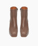 Front view of the Travis Boot in Taupe. This boot features a squared to box and is balanced with a platform.  3