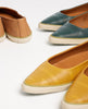 A close up of the pointed toe and perf detail on the Coclico Usha Sneakers. 5