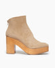 Side view: Coclico Vida Clog in Tobacco suede, a modern, minimalist clog with a 3.5 inch solid wood heel, angled topline and back zip closure. 1
