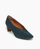 Angled view of the Wynne Pump in Bottle Suede: features a high-vamped, sweetheart cut that flatters the foot, while a soft chisel-toe and rounded center seam binding detail 2