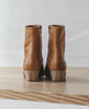 Caviars beautiful low-height wood block heel. 7