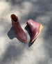 Outdoor, sunlit top view shot of the Coclico Java Boot in Merlot leather. 2