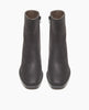 The Coclico Franna Boot in Black leather, top view: mid-height solid wood block black heel, stepped topline, squared-off toe, scored rubber sole, inside zip closure. 3