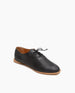 Coclico Holmes Flat in Black leather, angled view: elegant oxford flat with a rounded heel and modest squared-off toe. 2