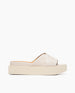 Coclico women's summer platform slide in a leather upper with a creamy white flatform sole. Coclico shoes are sustainably made in Spain. 2