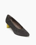Angle view of the Coclico Wumo Heel in New Anthracite suede, a seasonless slip-on heel with a choked throat line, subtle stichwork and a scultped, oval shaped solid wood heel in washed chartreuse. 5