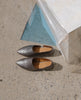 Coclico women's babouche inspired everyday flat with elegant cut in shimmering gunpowder metallic leather. Coclico shoes are sustainably made in Spain. 2