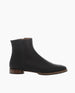 Coclico Egg Boot in Black Caviar textured leather: a classic ankle boot with a flat round wood-heel, patch sole and an inside zip closure - side view.  3