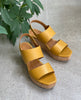 Close up of Coclico Massy Wedge in Ambra leather 6