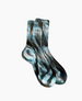 A pair of ribbed socks featuring a swirling tie-dye pattern in shades of blue, black, and white, with a mid-calf length and a soft, stretchy fabric. 2