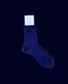 A single, dark blue, mid-calf sock with a cable knit pattern, a ribbed cuff, and a white label attached near the top. 1